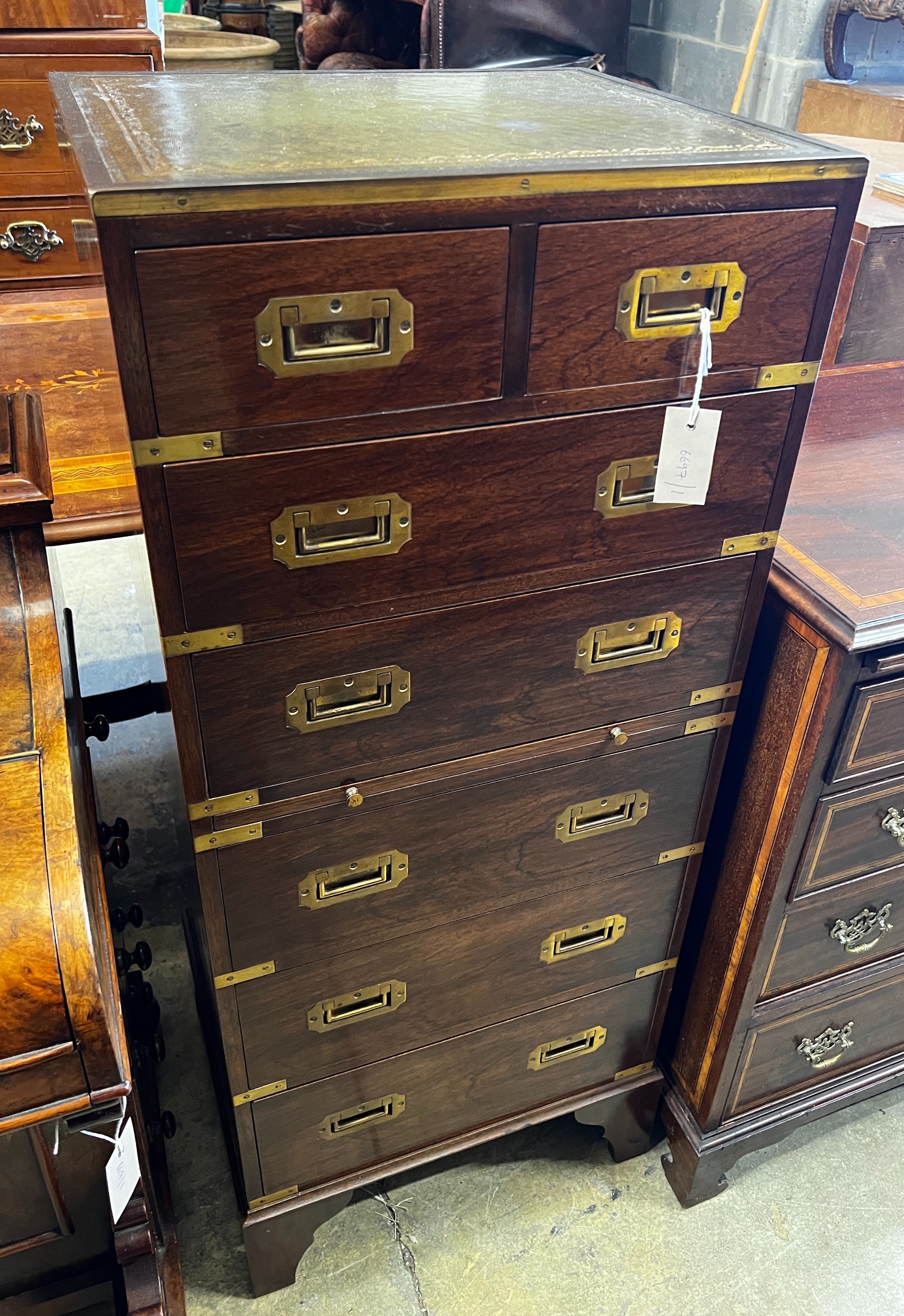 A narrow reproduction brass mounted mahogany military style chest fitted slide, width 46cm, depth 40cm, height 113cm